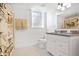 Bright bathroom features tiled floors, stylish vanity with granite countertop, and decorative shower curtain at 4554 Meadow Valley Dr, Atlanta, GA 30342