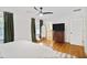 Bright bedroom with hardwood floors, ceiling fan, and neutral décor at 4554 Meadow Valley Dr, Atlanta, GA 30342