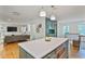 Bright, modern kitchen with an island, stainless appliances, and hardwood floors at 4554 Meadow Valley Dr, Atlanta, GA 30342