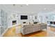 Inviting living room with hardwood floors and a decorative fireplace at 4554 Meadow Valley Dr, Atlanta, GA 30342