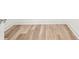 Close-up showcases durable wood flooring and clean baseboards, perfect for a modern aesthetic at 490 Hammons Way, Atlanta, GA 30315