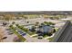 An eye-level aerial shot features the property amenities including a pool, tennis courts, and clubhouse at 1500 Tara Pl # 810, Hampton, GA 30228
