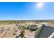 Expansive aerial view showcases community pool, tennis courts, and a surrounding landscape under a bright blue sky at 1500 Tara Pl # 810, Hampton, GA 30228