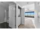 Bright bathroom featuring a laundry closet and tiled floors for convenience at 1500 Tara Pl # 810, Hampton, GA 30228