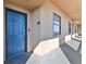 Exterior shot of unit entrance with a blue door and visible unit number at 1500 Tara Pl # 810, Hampton, GA 30228