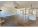 Spacious living area featuring high ceilings, hardwood floors, and a stone fireplace at 31 Cedar Gate Ln, Kingston, GA 30145