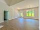 Open living room with hardwood floors, large windows, and a bright, airy atmosphere at 31 Cedar Gate Ln, Kingston, GA 30145