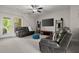 Spacious living area with access to a balcony and outdoor views at 705 Abbington River Ln, Atlanta, GA 30339