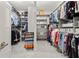 Spacious walk-in closet with ample storage and well-organized shelving for ultimate organization at 705 Abbington River Ln, Atlanta, GA 30339