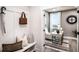 Bright home office featuring white desk, chair, and decorative accents at 719 Crossroad Ct, Powder Springs, GA 30127