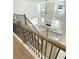 Bright living room featuring high ceilings, large windows, and modern staircase at 719 Crossroad Ct, Powder Springs, GA 30127