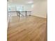 Open loft space featuring stylish railing, light floors, and abundant natural light at 719 Crossroad Ct, Powder Springs, GA 30127