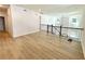 Upstairs living area with hardwood floors, iron railing, and natural light from the windows at 719 Crossroad Ct, Powder Springs, GA 30127