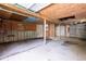 Unfinished basement with concrete floors, exposed beams, and cinder block walls at 1104 Victory Sw Dr, Atlanta, GA 30310