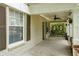Covered front porch featuring a ceiling fan and brick accents at 1104 Victory Sw Dr, Atlanta, GA 30310