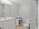 Bathroom with vanity and storage plus shower over bath at 896 Winn Rd, Douglasville, GA 30134