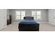 Neutral secondary bedroom with windows and a wardrobe at 896 Winn Rd, Douglasville, GA 30134