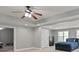 Spacious bonus room with recessed lights, multiple windows, and modern ceiling fan at 896 Winn Rd, Douglasville, GA 30134