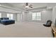 Large bonus room/ bedroom offers flexible living space with comfortable seating at 896 Winn Rd, Douglasville, GA 30134