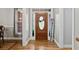 Inviting foyer with wood floors, sidelights, and a decorative entry door at 896 Winn Rd, Douglasville, GA 30134