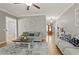 Open concept living room with hardwood floors and neutral color scheme at 896 Winn Rd, Douglasville, GA 30134