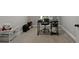 Home office with desk, chair, and storage shelves for organization at 896 Winn Rd, Douglasville, GA 30134