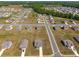 Aerial view of homes, streets and landscaping in the community at 1259 Fendt Dr, Locust Grove, GA 30248