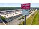 Aerial view of Tanger Outlets with retail stores and parking lot at 1259 Fendt Dr, Locust Grove, GA 30248