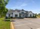 Exterior view of the community clubhouse with parking at 1259 Fendt Dr, Locust Grove, GA 30248