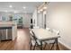 Eat in dining room with stainless steel appliances, hardwood floors and lots of natural light at 1259 Fendt Dr, Locust Grove, GA 30248