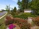 Well landscaped entrance sign for Bunn Farms community at 1259 Fendt Dr, Locust Grove, GA 30248