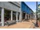 Charming storefronts with outdoor seating, showcasing local businesses with a small town feel at 1259 Fendt Dr, Locust Grove, GA 30248