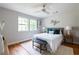 Cozy bedroom with hardwood floors, natural light, and neutral decor for a relaxing atmosphere at 1412 Woodbine Se Ave, Atlanta, GA 30317
