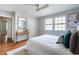 Comfortable bedroom with hardwood floors, natural light, and access to hallway at 1412 Woodbine Se Ave, Atlanta, GA 30317