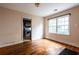 Bedroom showcasing hardwood floors and natural light through the window at 1594 Lincoln Se Ave, Atlanta, GA 30317