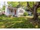 Charming single-story home with a welcoming front porch and beautifully landscaped front yard at 1594 Lincoln Se Ave, Atlanta, GA 30317