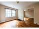 Open living space with hardwood floors, a ceiling fan, and ample natural light at 1594 Lincoln Se Ave, Atlanta, GA 30317