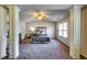 Spacious bedroom featuring neutral walls, an area rug, and abundant natural light at 2325 Thackery Rd, Snellville, GA 30078