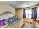 Bedroom with large window, allowing natural light at 2325 Thackery Rd, Snellville, GA 30078