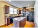 Modern kitchen features a large island, granite countertops, and stainless appliances at 2325 Thackery Rd, Snellville, GA 30078