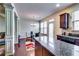 Open concept kitchen with stainless appliances, granite counters, an island, and an adjacent dining area at 2325 Thackery Rd, Snellville, GA 30078