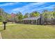 Inviting home with a spacious front yard, flagpole, and neatly kept lawn at 507 Honeysuckle Ln, Woodstock, GA 30188