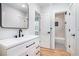 Modern bathroom featuring a sleek vanity, and a shower/tub combination at 5260 Moore St, Stone Mountain, GA 30083