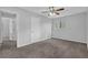 Light-filled bedroom with neutral walls and carpet at 616 Country Lane Dr, Jonesboro, GA 30238