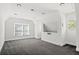 Upstairs bonus room with carpet and a window; neutral paint at 2839 Echols Rd, Cumming, GA 30041