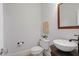 Cozy half bathroom with a vessel sink, stone counter, and neutral paint at 2839 Echols Rd, Cumming, GA 30041