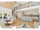Open floor plan showcasing a kitchen, dining area, wood stairs, and a wood ceiling at 2839 Echols Rd, Cumming, GA 30041