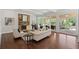 Elegant living room with a stone fireplace and plenty of natural light at 2839 Echols Rd, Cumming, GA 30041