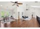 Open loft area with vaulted ceilings, skylights, hardwood floors, and neutral paint at 2839 Echols Rd, Cumming, GA 30041