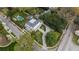 Stunning aerial view of the property showcasing the pool, garden, and grand home nestled among trees at 315 Peachtree Battle Nw Ave, Atlanta, GA 30305